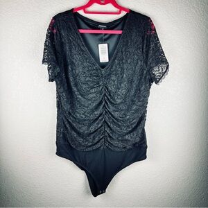Torrid black lace cinched front bodysuit size 1